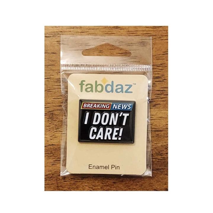 Breaking News, I Don't Care Enamel Pin with Metal Frame